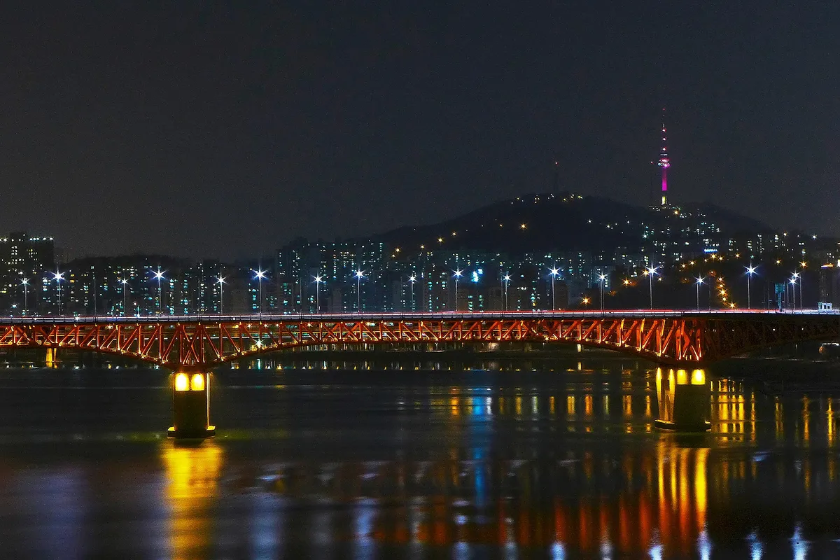 Night view of the Han River with Seongsu Bridge lit up and N Seoul Tower behind
